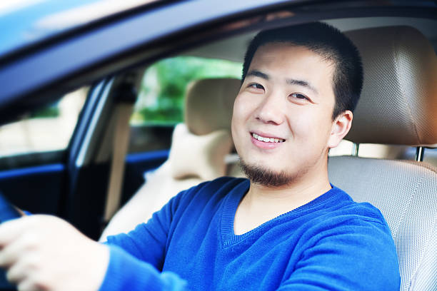 istock Asian man driving car 183372249
