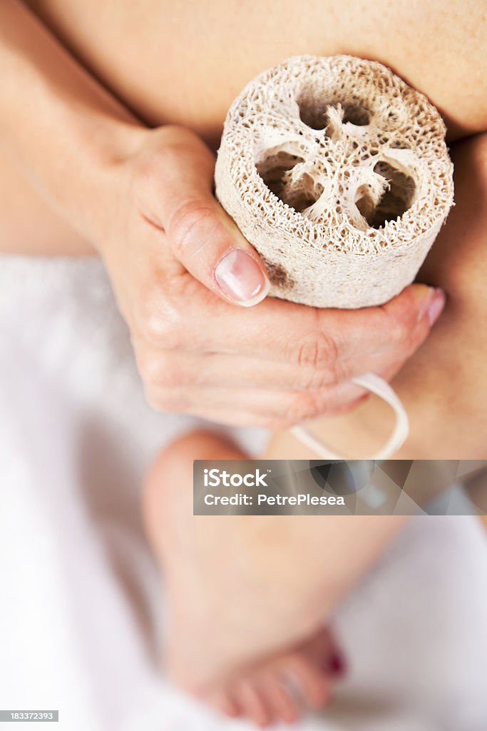 Organic Natural Body Care. Anti Cellulite Massage with Sponge. Handmade. Beautiful woman taking care of her body with natural products at home. Cellulite massage with natural sponge.Selective focus. Shallow depth of field. Mode body care and natural products in this lightboxes: Only Women Stock Photo