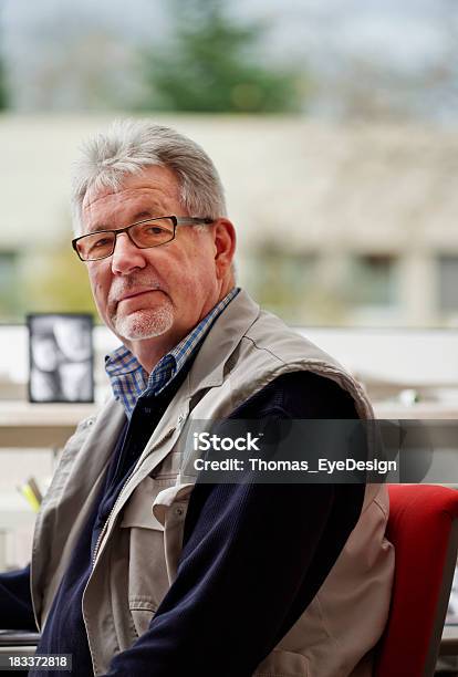 Senior Man At An Office Desk Stock Photo - Download Image Now - 60-64 Years, 60-69 Years, Active Seniors