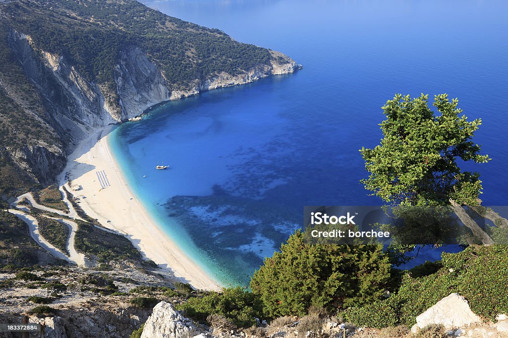 Myrtos Beach Kefalonia Myrtos is the most famous beach on Kefalonia (Cephalonia) and has been voted one of Europe's most beautiful. Kefalonia Stock Photo