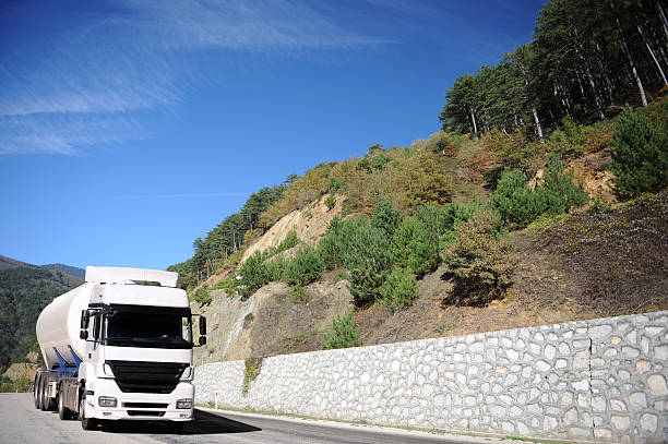 istock Truck driving on country-road 183373183