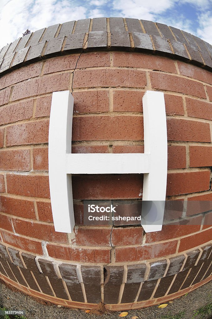 Letter H sign Close up of letter h sign through fisheye Alphabet Stock Photo