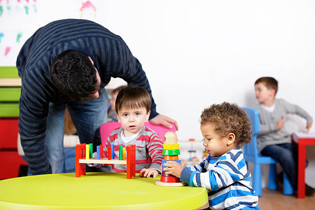 istock Children In A Nursery Setting Enjoyng Various Activties 183373650