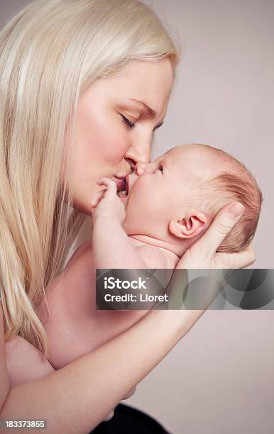 Mother Kissing Baby Stock Photo - Download Image Now - Beauty, Child, Mother