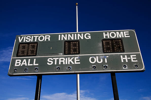 istock Baseball Scoreboard Against Blue Sky 183374339