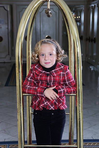 istock Riding a Hotel Luggage Cart 183374404