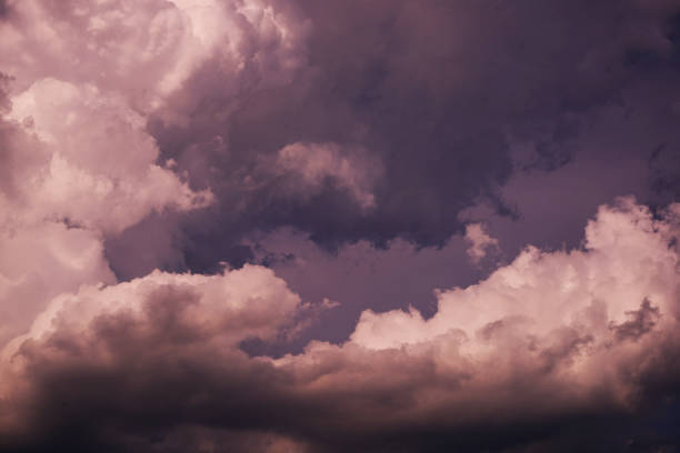 dramatic  sky with storm clouds. gray blue purple pink white skies background. stormy rain wind cloudy. dark. evening sunset. - color image light pink dramatic sky imagens e fotografias de stock
