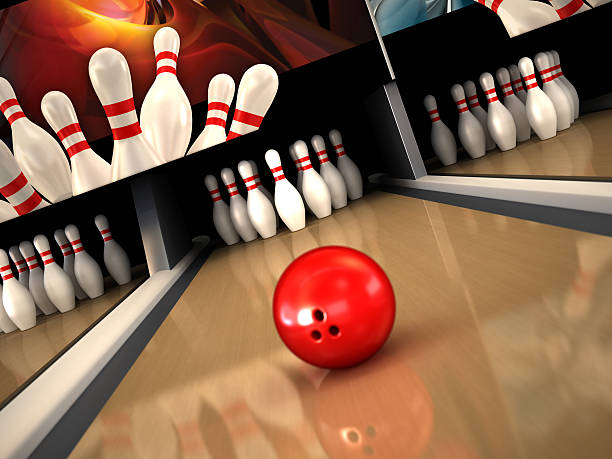 Bowling strike "Red bowling ball going for a strike. Focus on the bowling pins. For an emphasised speed effect, Photoshop radial blur / zoom effect is recommended...Similar images:" bowling alley wood stock pictures, royalty-free photos & images