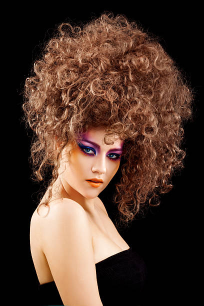 istock sensual woman with multicolored make-up looking at camera 183374729