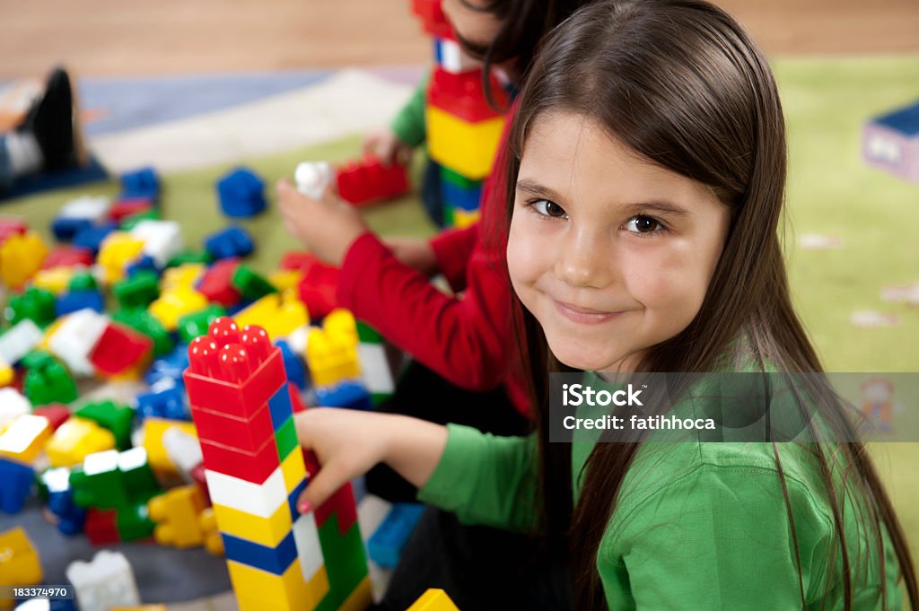 Happy Girl Happy girl is playing with toy block. 4-5 Years Stock Photo