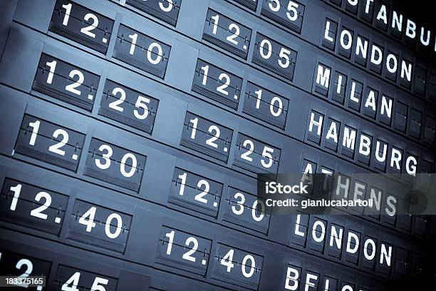 International Arrival Or Departure Flight Information Board Stock Photo - Download Image Now