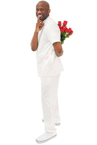 African American Man with Flowers Behind His Back