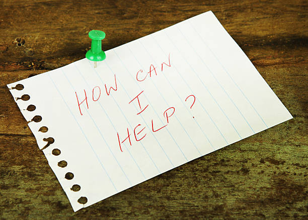 istock Handwritten how can I help note pinned with green thumb tack 183375546