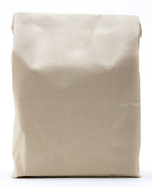 istock Brown paper shopping bag folded closed 183375704