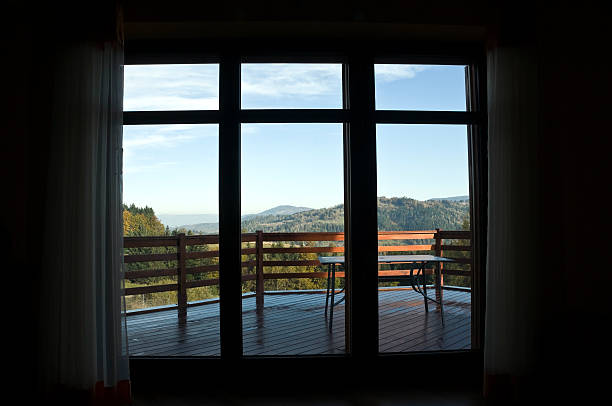 istock mountains view from window in early morning 183375883