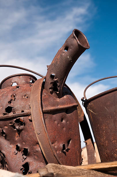 istock Antique Bullet Riddled Oil Can 183376312