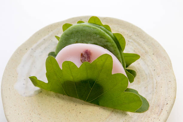 istock Sakuramochi and Kusamochi (Bean paste rice cake wrapped in a beech leaf) 1833772683