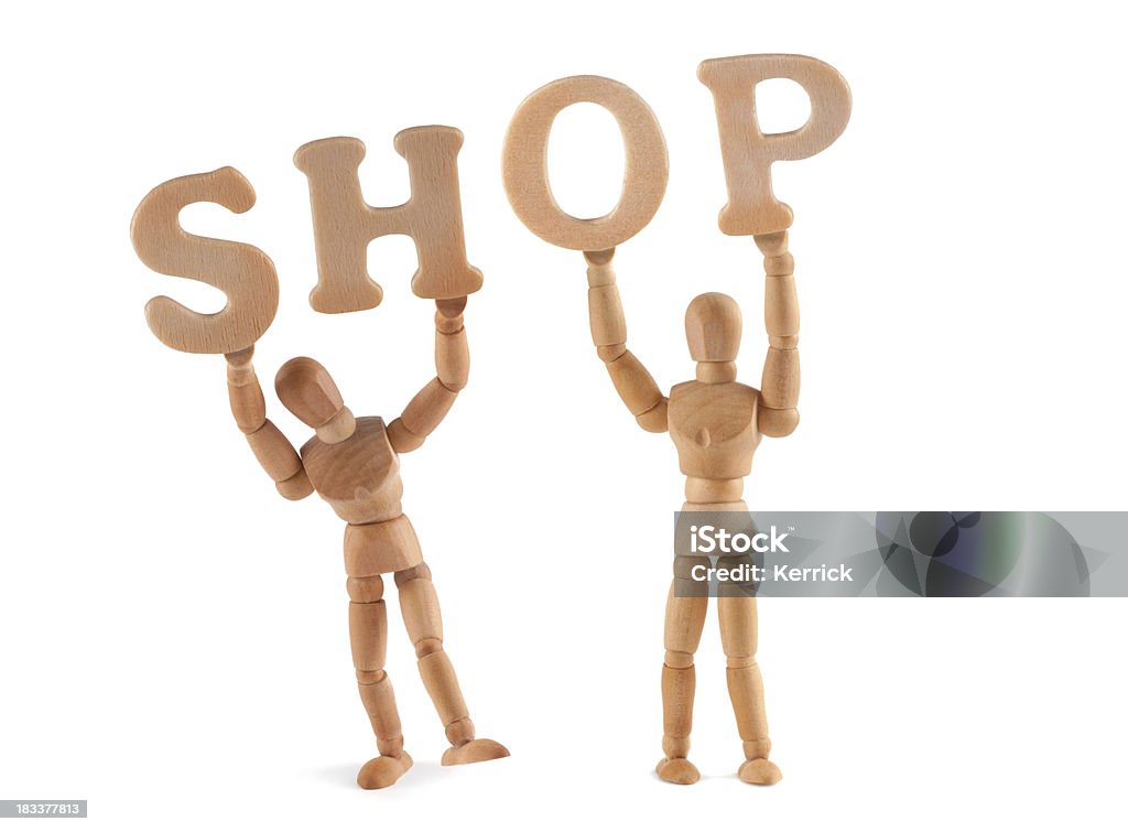 Shop-Hölzerne Kleiderpuppe, die dieses Wort - Lizenzfrei Alphabet Stock-Foto