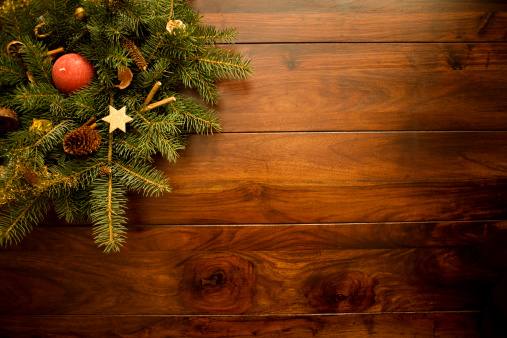 Advent wreath with a single red candle and a golden star on a wooden surface. Christmas decoration. Background. Copy space. Vignette. Directly above. XXXL (Canon Eos 1Ds Mark III)