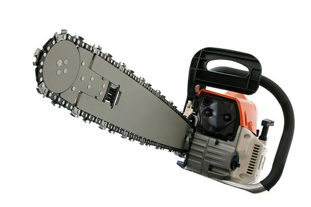 Close-up of chain saw isolated on white background The Chain Saw front view on the white background. chainsaw stock pictures, royalty-free photos & images