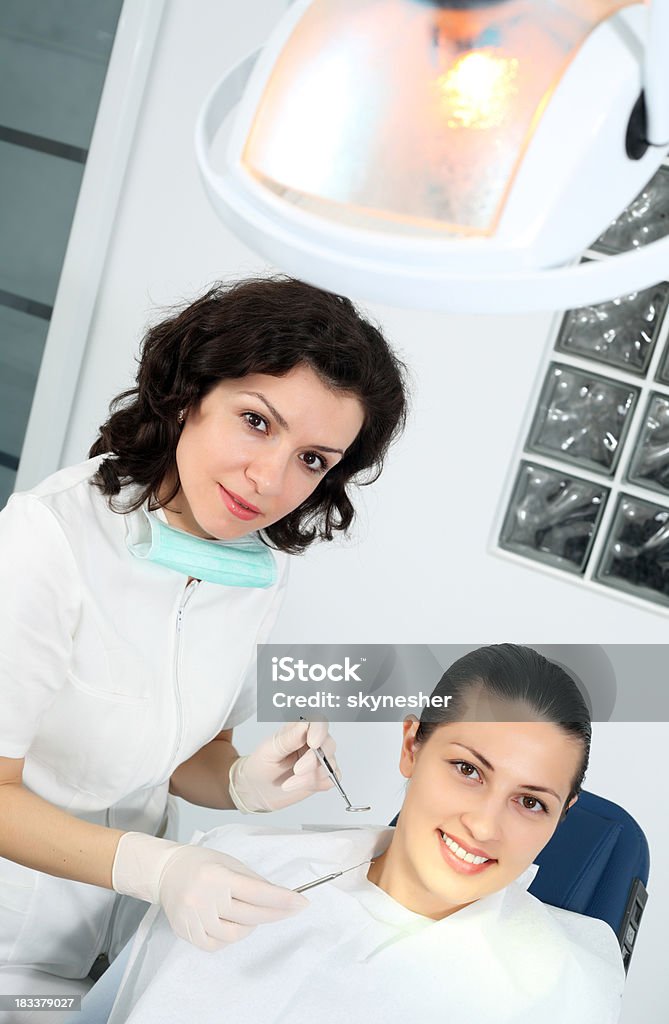 Dentista visita. - Foto stock royalty-free di Accudire