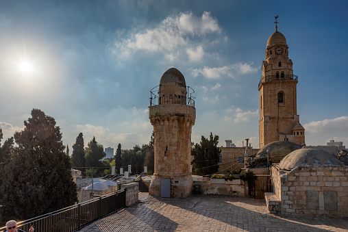 The bell towers in Dormition Abbey at sunset, near Zion Gate, Jerusalem Old City. Israel.