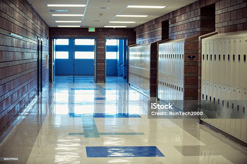 High School Hallway a high school hallway / that has nobody in it / but will soon enough Corridor Stock Photo