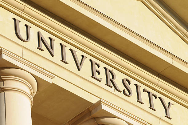 大学サインのクローズアップ - university sign column close up ストックフォトと画像
