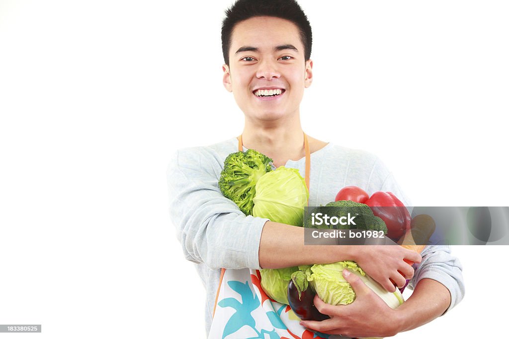 I love vegetable "one young asian man holding vegetables and looking at camera happily  , healthy eating issue" 20-24 Years Stock Photo