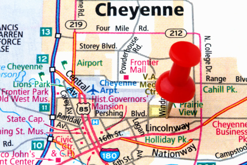 A red pushpin on a map pointing to Cheyenne - the capital of Wyoming.