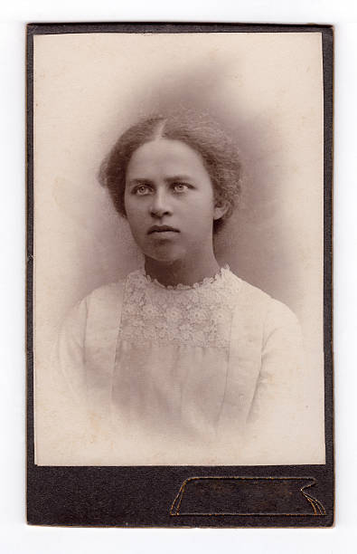 Vintage photograph of a young woman "Vintage photograph of a young woman, photo aged 1910s" 19th century style photos stock pictures, royalty-free photos & images