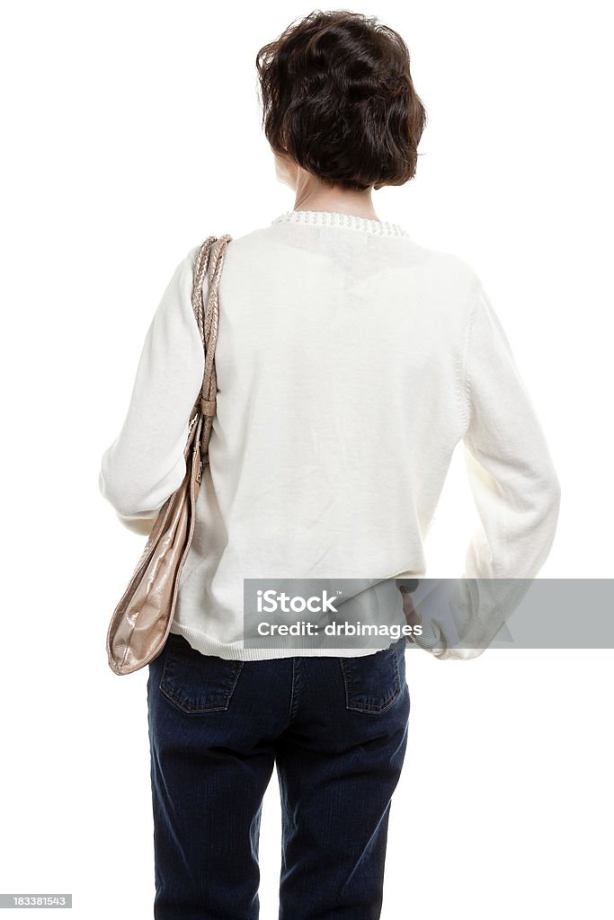 Rear View Of Mature Woman With Purse Portrait of a mature woman on a white background. Rear View Stock Photo