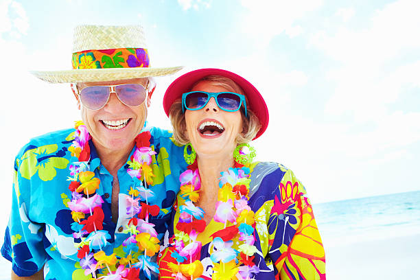 istock Retired couple enjoying the beach 183381717