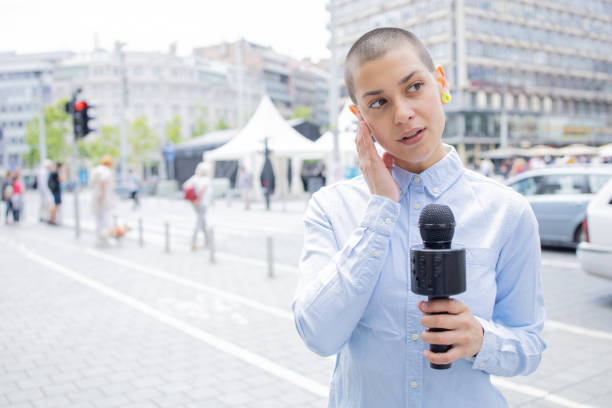 istock TV reporter on a live report 1833822726