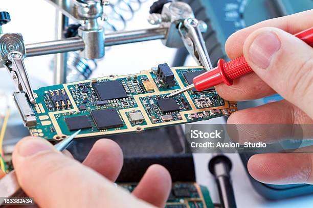 Repair Mobile Phone By A Service Stock Photo - Download Image Now - Repairing, Mobile Phone, Electronics Industry