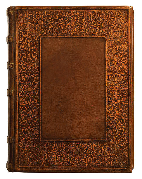 Antique Leather Book Cover Centuries old leather book with intricate border. book cover stock pictures, royalty-free photos & images