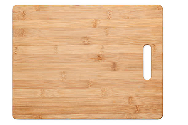 Cutting Board Isolated "Bamboo cutting board isolated on white, with clipping path.Please also see:" cutting board stock pictures, royalty-free photos & images