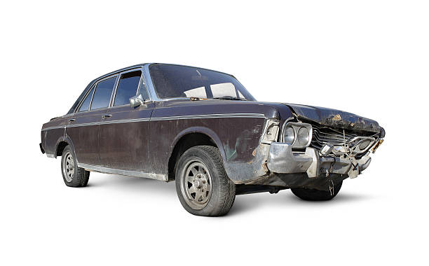 Old brown car with damaged front over a white background stock photo