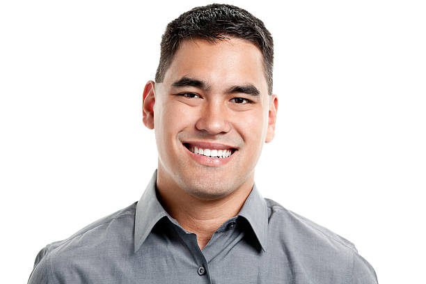 Happy Smiling Young Man Headshot Portrait Portrait of a young male on a white background. crew cut stock pictures, royalty-free photos & images