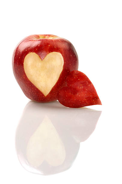 istock Red Apple With Heart Symbol 183383778