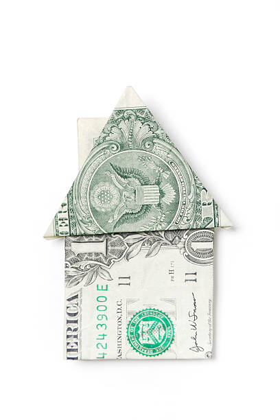 istock Folded Origami Dollar Bill House Shape on White 183384161