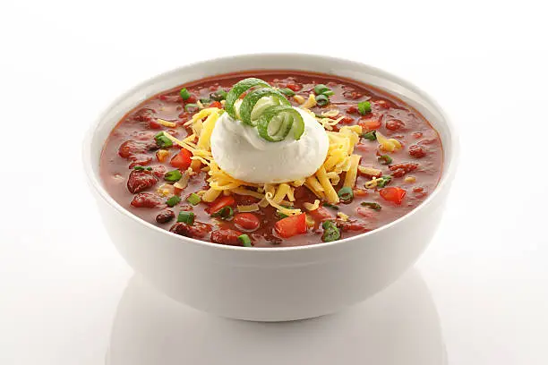 Photo of Close of up vegetarian chili in white bowl