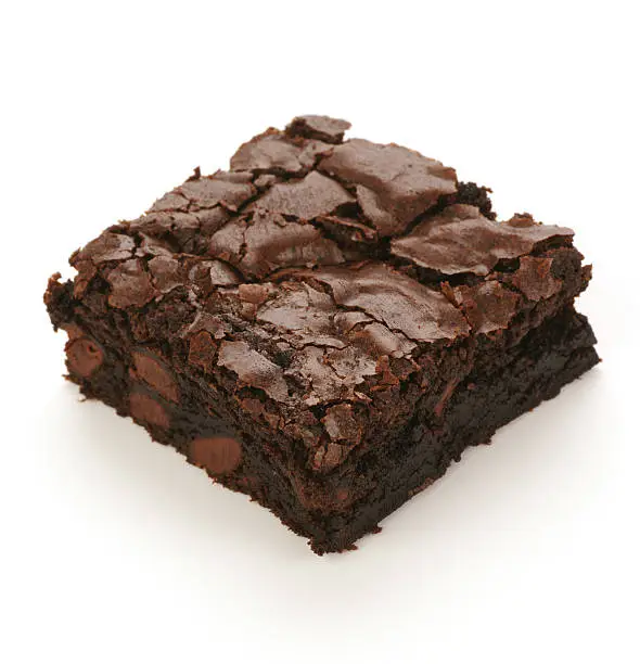 Double dark chocolate brownie isolated on white.
