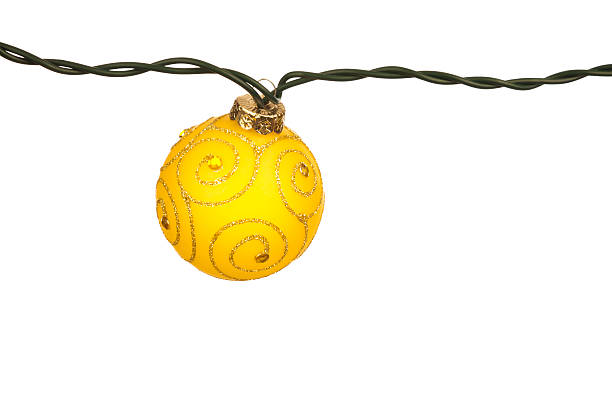 istock Yellow Illuminated Holiday Ornament on White Background 183384756