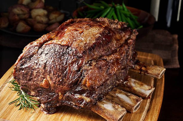 prime rib rösten - roast meat stock-fotos und bilder