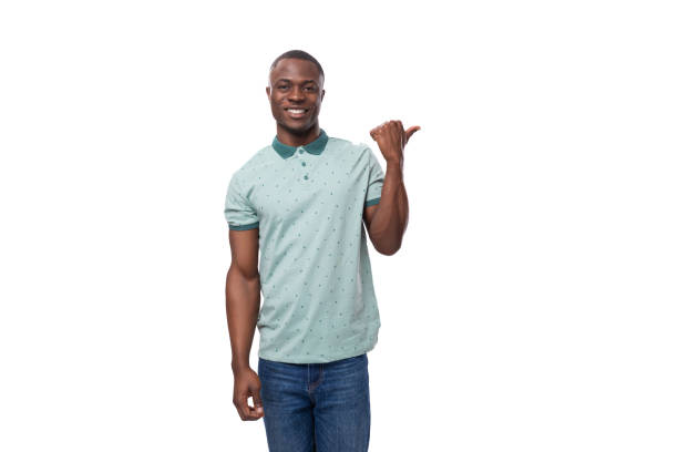 istock young well-groomed african man dressed casually gesturing with his hand to the side with save space 1833853614