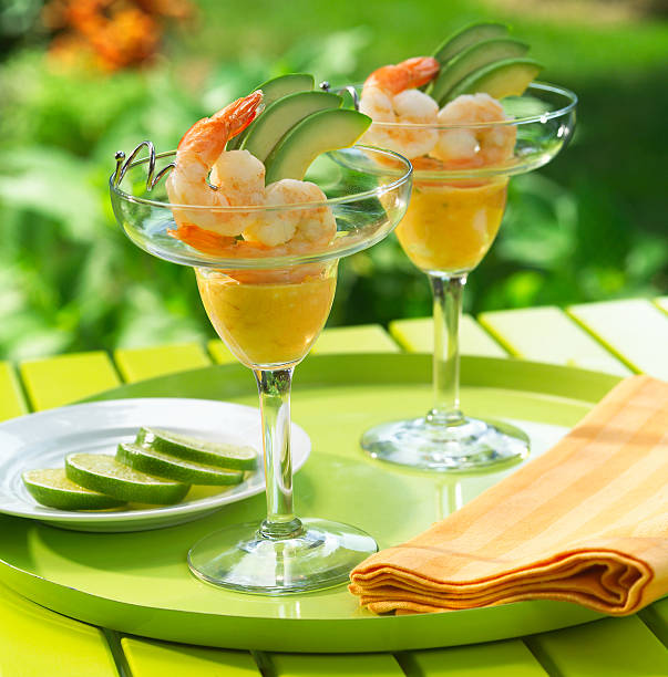 Margarita shrimp cocktail Shrimp cocktail in a margarita glass with avocado slices and dipping sauce.Please see some other shrimp images from my portfolio: shrimp cocktail stock pictures, royalty-free photos & images