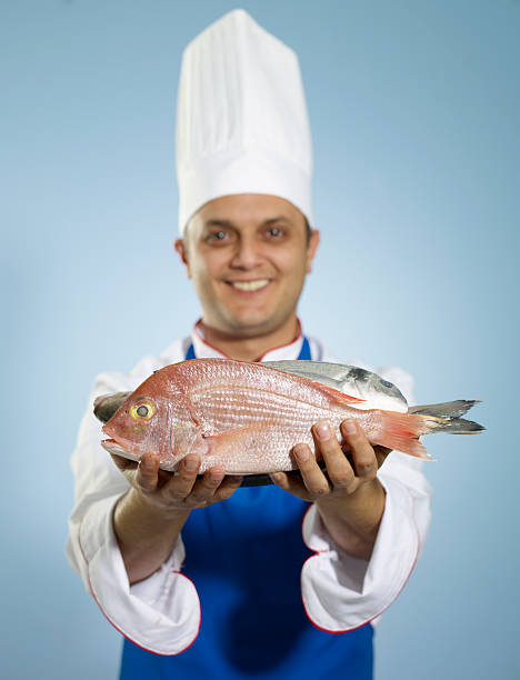 Chef Holding Fish