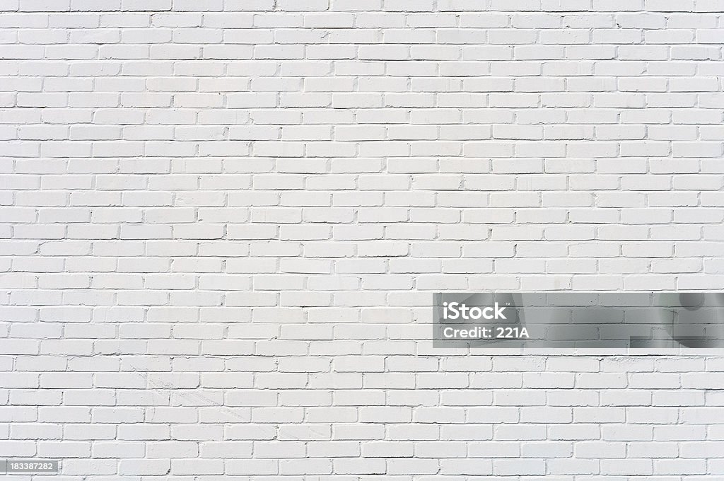 Background: brick wall painted white Uneven brick wall painted white. Soft lighting with good detail.Related image: Wall - Building Feature Stock Photo