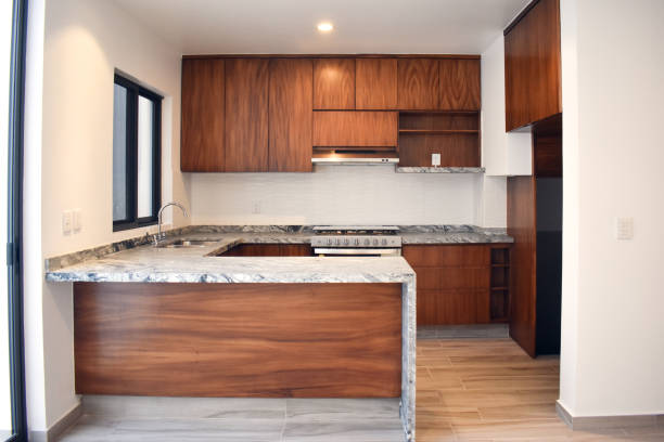 istock Wooden kitchen with gray bar 1833911139